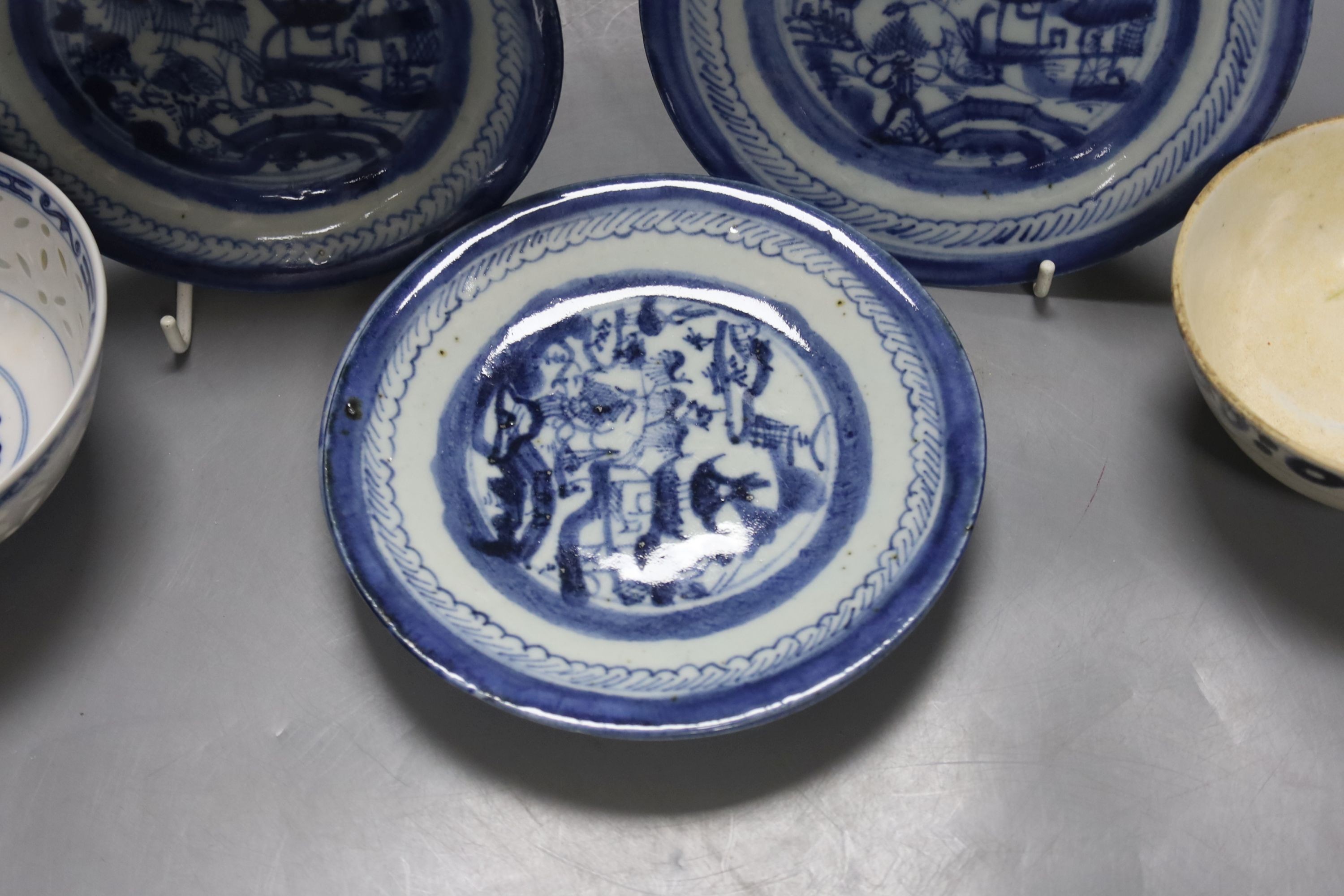 Four 19th century Chinese blue and white plates and two bowls, plates 15 cms diameter.